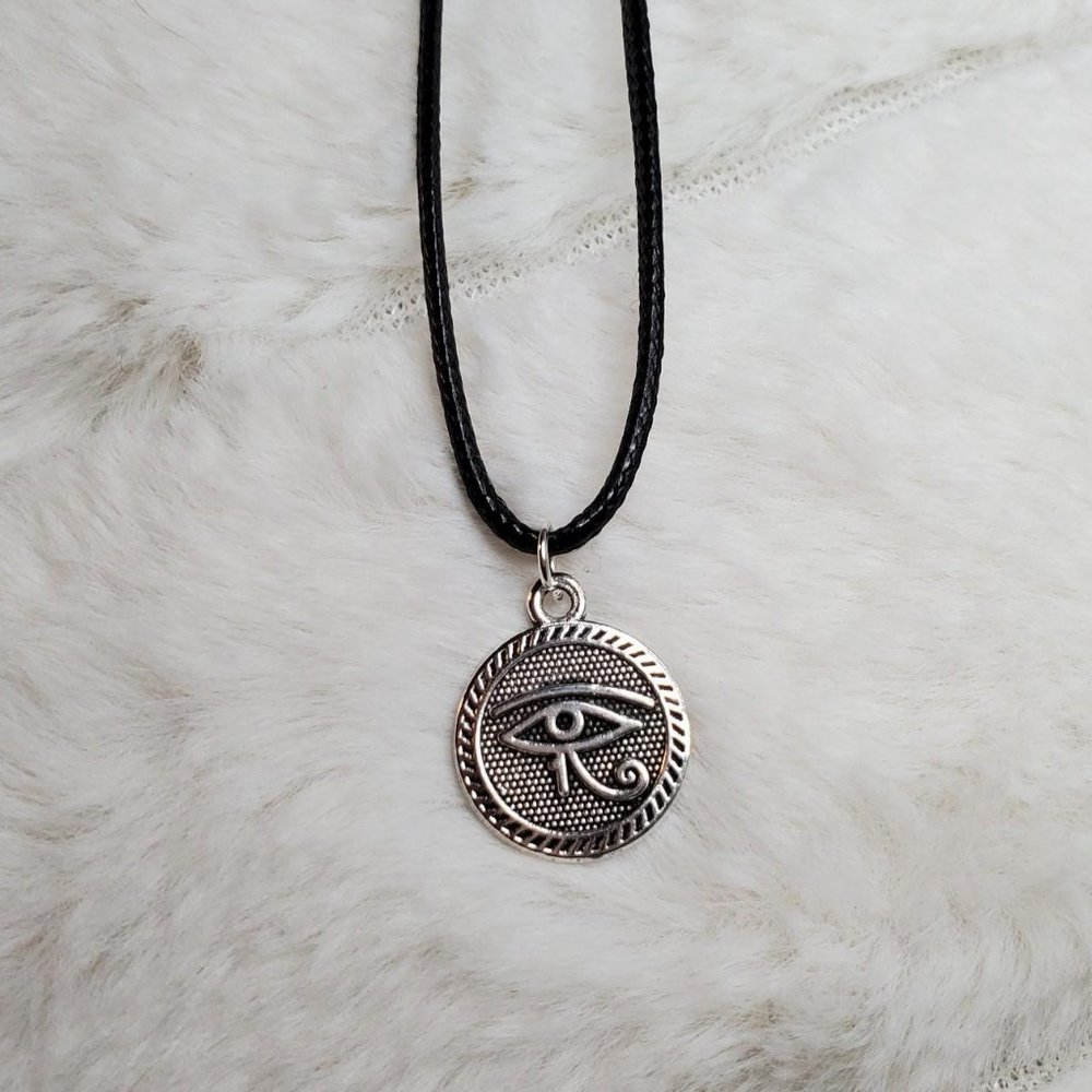 Circle eye of horus charm necklace.